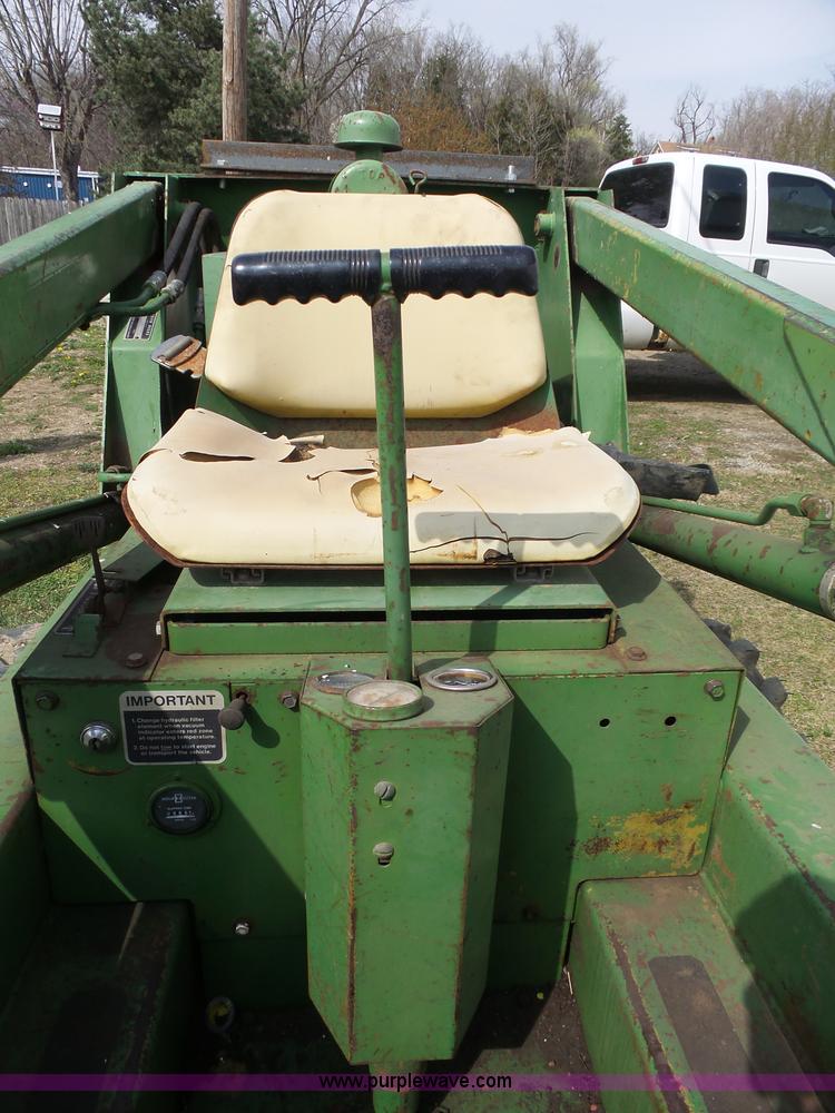 image for item J4174 John Deere 70 skid steer