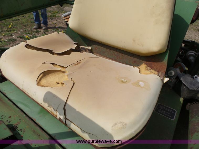 image for item J4174 John Deere 70 skid steer