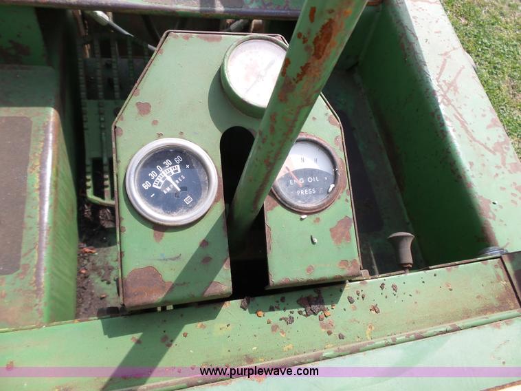 image for item J4174 John Deere 70 skid steer