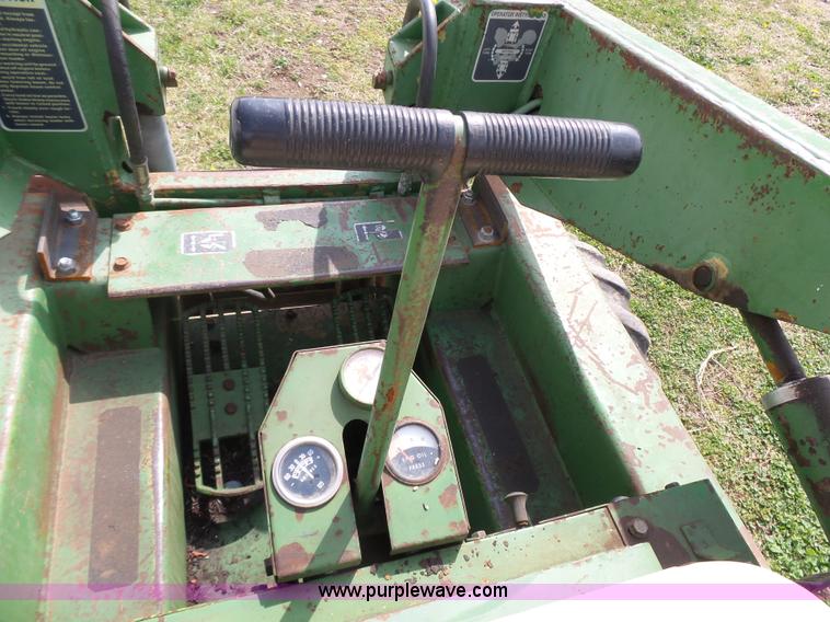 image for item J4174 John Deere 70 skid steer