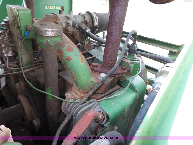 image for item J4174 John Deere 70 skid steer