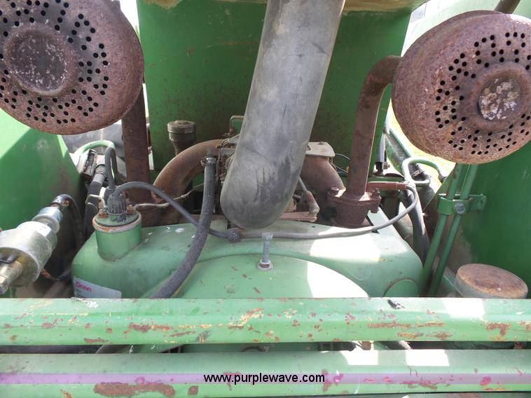 image for item J4174 John Deere 70 skid steer