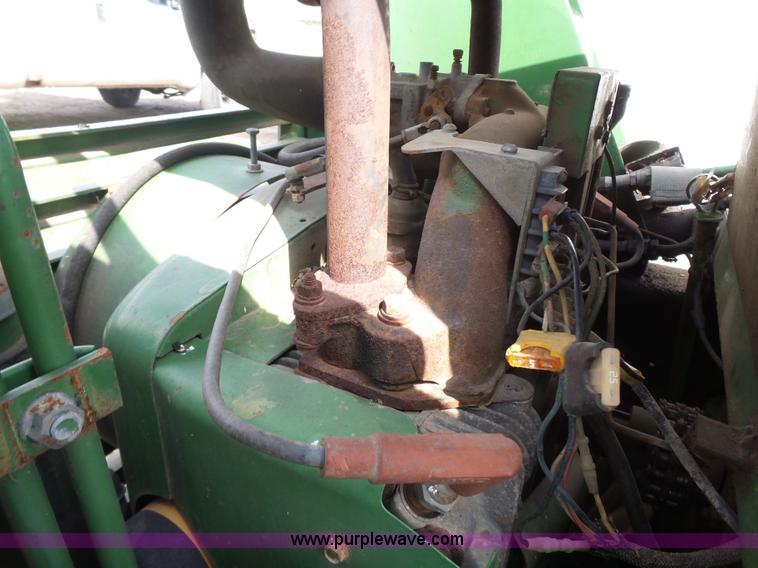 image for item J4174 John Deere 70 skid steer