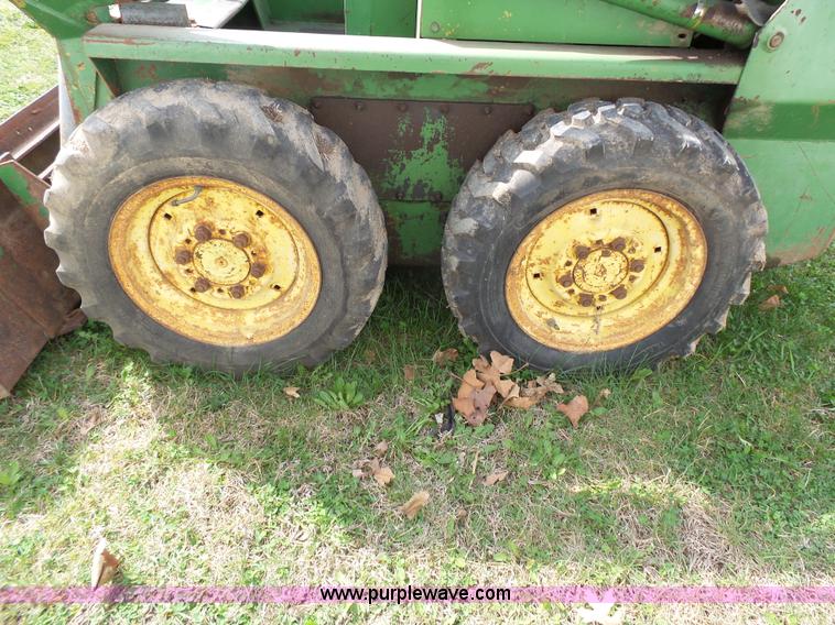 image for item J4174 John Deere 70 skid steer