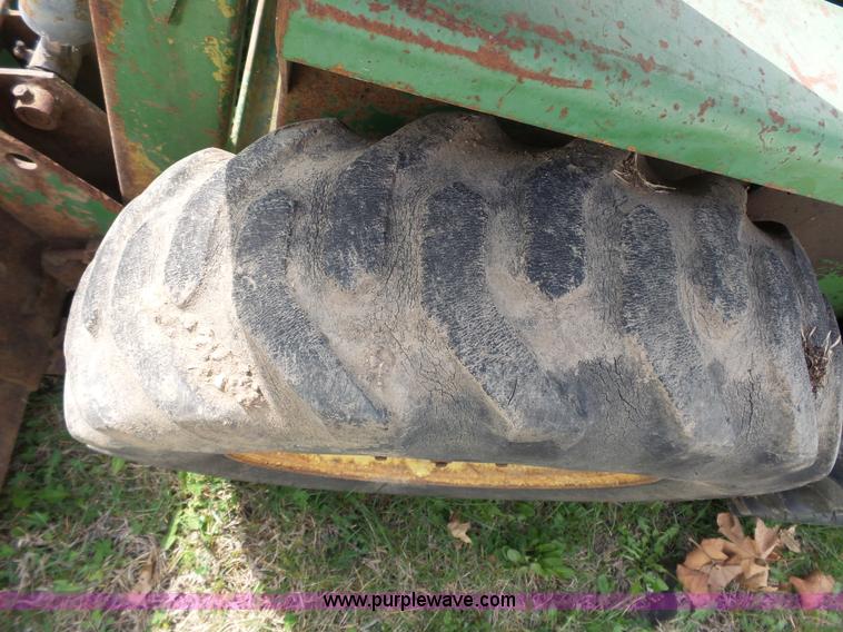 image for item J4174 John Deere 70 skid steer