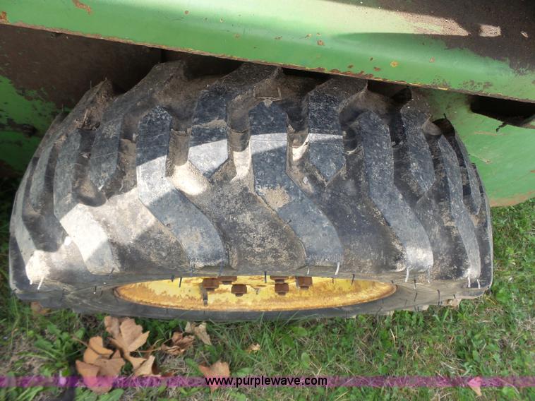 image for item J4174 John Deere 70 skid steer