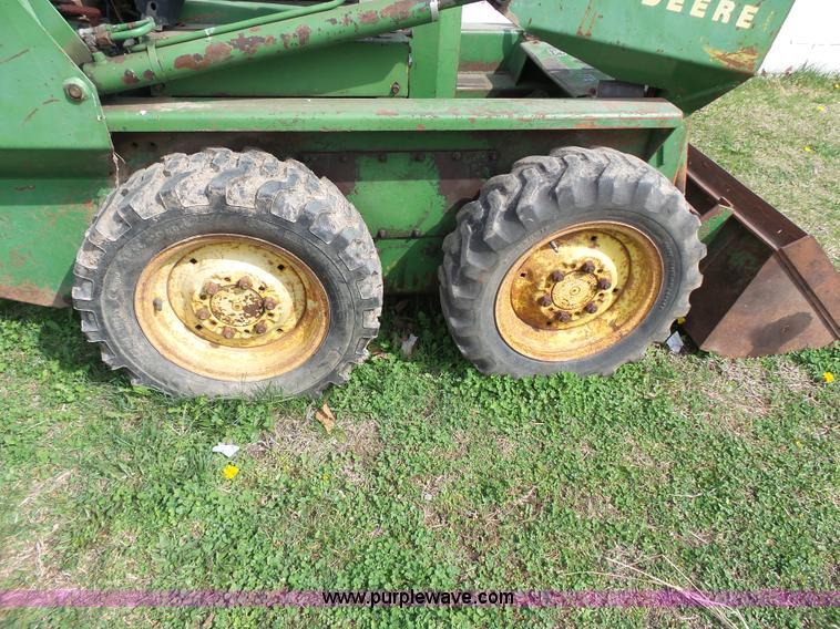 image for item J4174 John Deere 70 skid steer