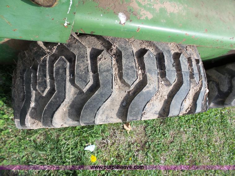 image for item J4174 John Deere 70 skid steer