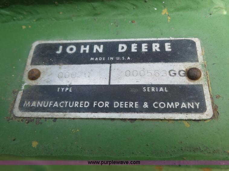 image for item J4174 John Deere 70 skid steer