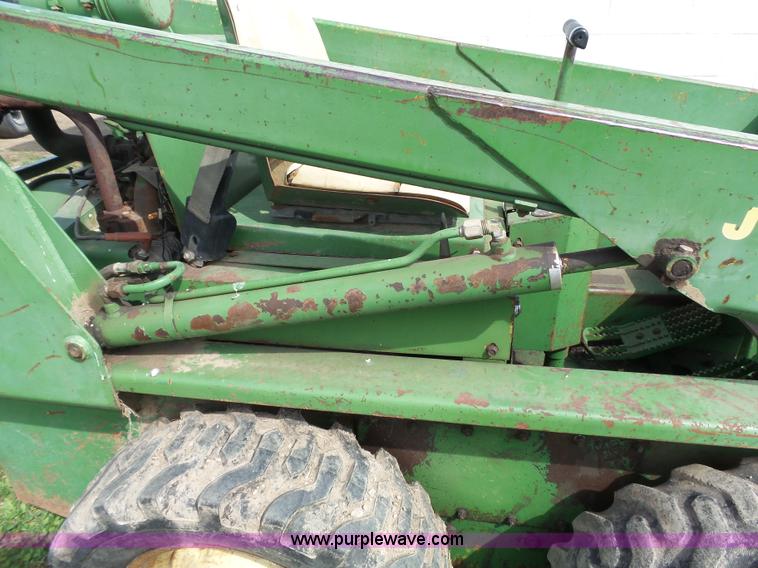 image for item J4174 John Deere 70 skid steer