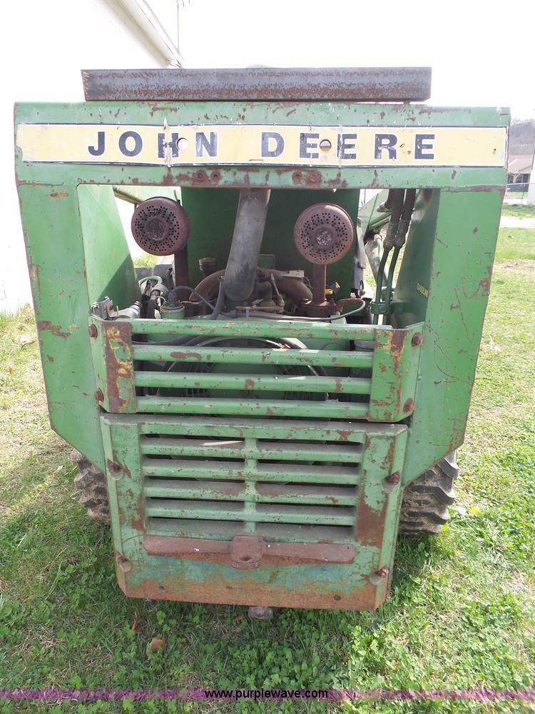 image for item J4174 John Deere 70 skid steer