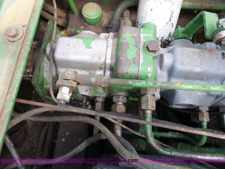 image for item J4174 John Deere 70 skid steer