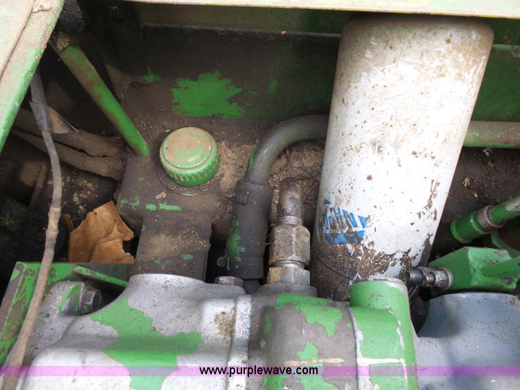 image for item J4174 John Deere 70 skid steer