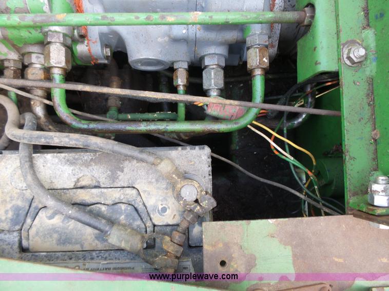 image for item J4174 John Deere 70 skid steer