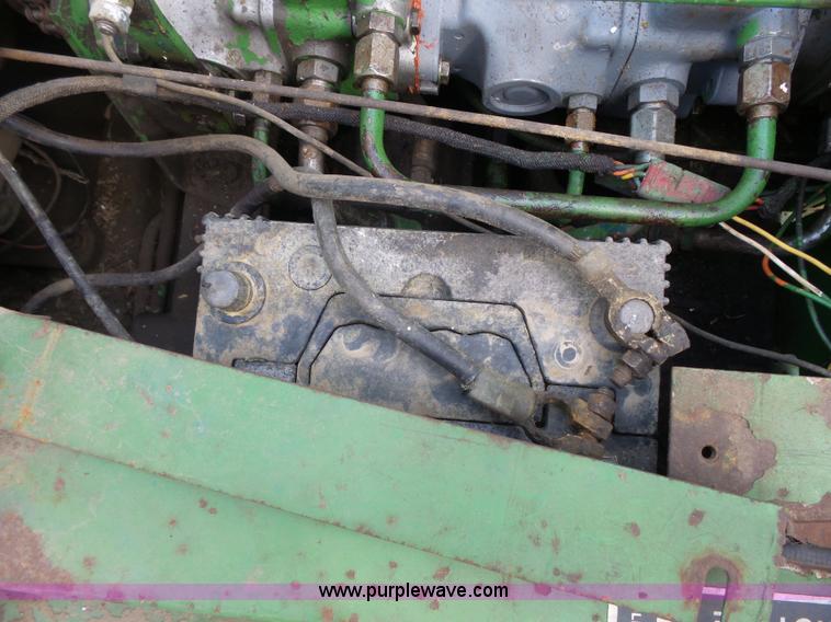 image for item J4174 John Deere 70 skid steer