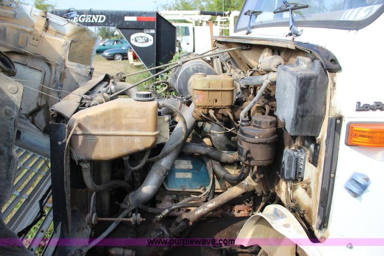 image for item J4355 1998 International 4700LPX flatbed truck