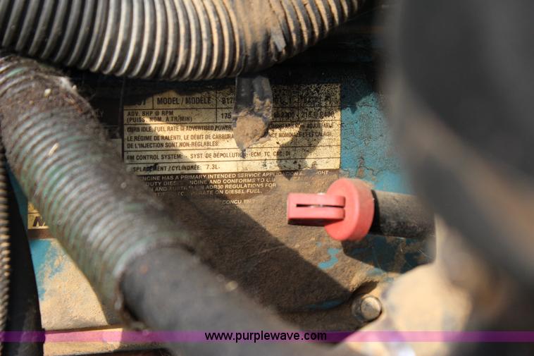 image for item J4355 1998 International 4700LPX flatbed truck