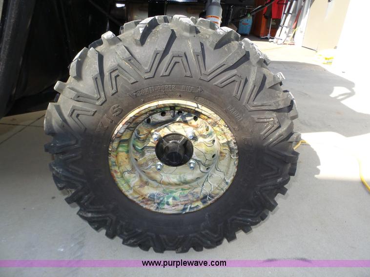 image for item J8957 2012 Kawasaki Teryx4 utility vehicle