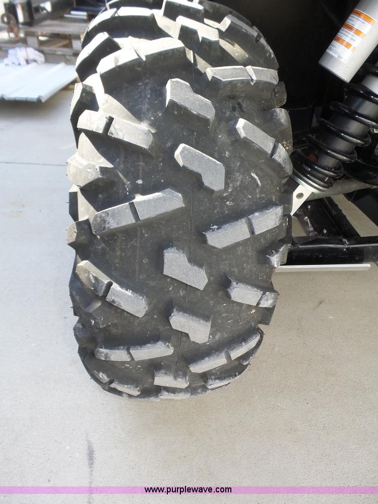 image for item J8957 2012 Kawasaki Teryx4 utility vehicle