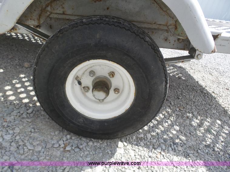 image for item J8961 Snowco tilt deck snow mobile trailer