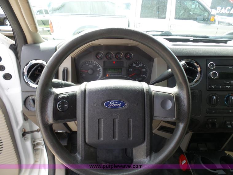 image for item K4303 2010 Ford F550 XLT Crew Cab flatbed truck