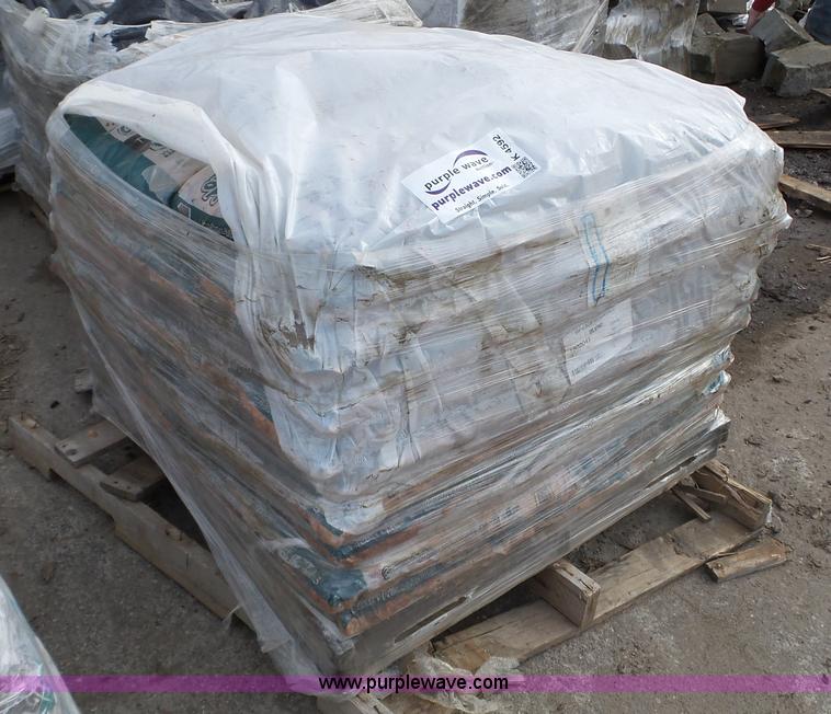 image for item K4592 (63) bags of rock mulch