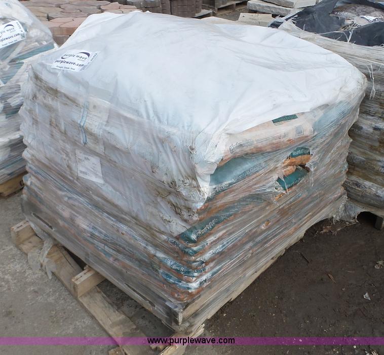 image for item K4592 (63) bags of rock mulch