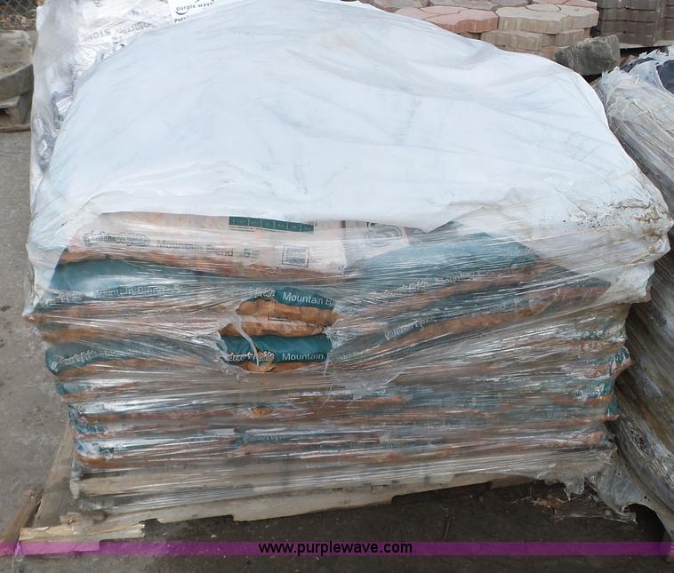 image for item K4592 (63) bags of rock mulch