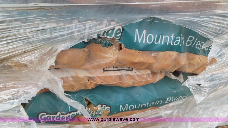 image for item K4592 (63) bags of rock mulch