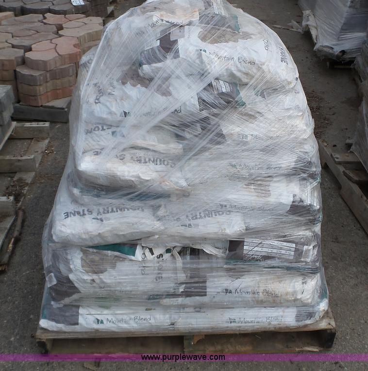 image for item K4594 Approximately 50 bags of rock mulch