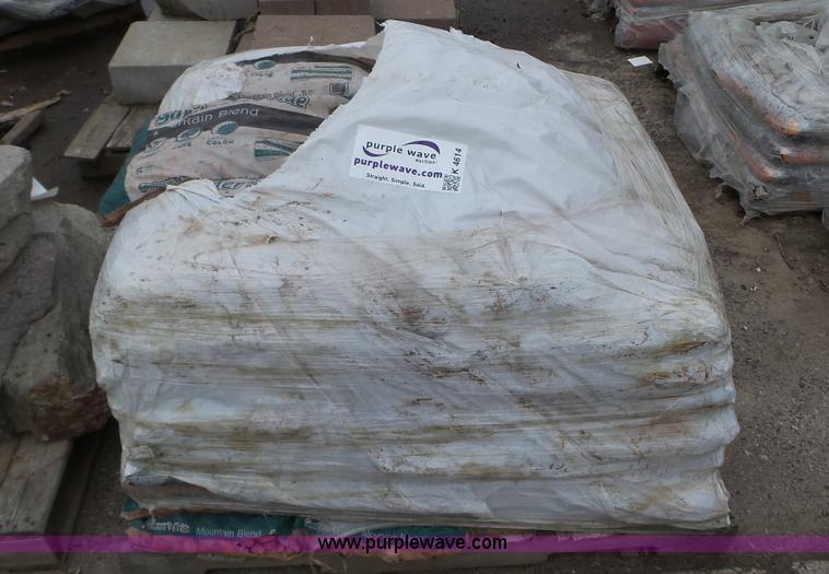 image for item K4614 Approx. 50 bags of rock mulch