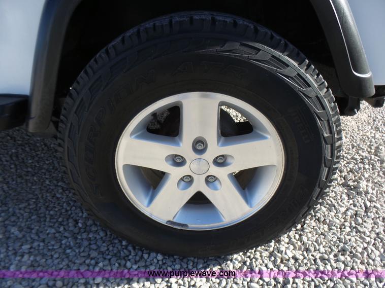 image for item L5472 1992 Jeep Wrangler Islander SUV