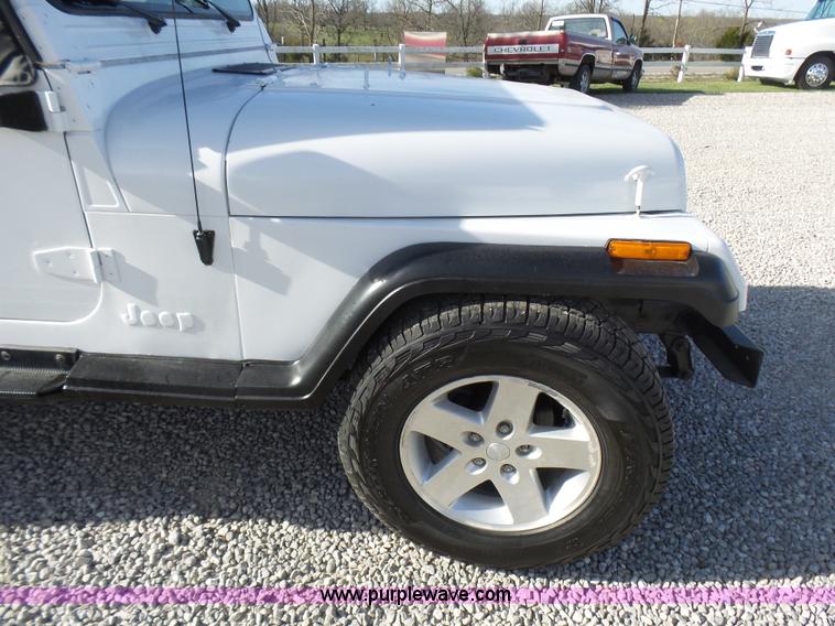 image for item L5472 1992 Jeep Wrangler Islander SUV