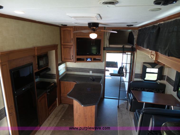 image for item L5791 2011 Raptor Velocity travel trailer RV