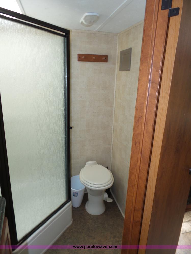 image for item L5791 2011 Raptor Velocity travel trailer RV