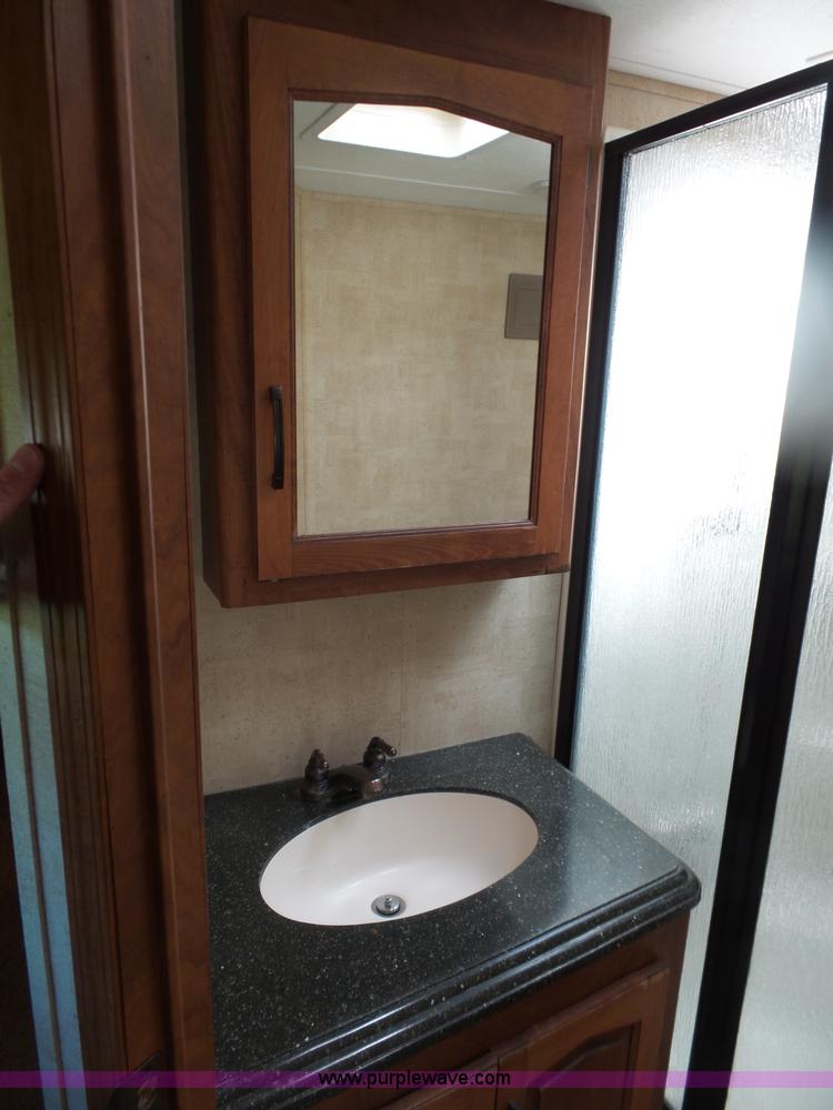 image for item L5791 2011 Raptor Velocity travel trailer RV