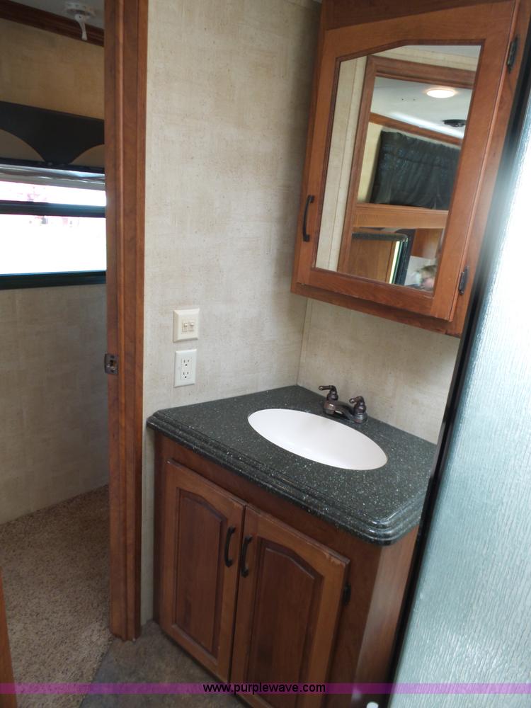 image for item L5791 2011 Raptor Velocity travel trailer RV