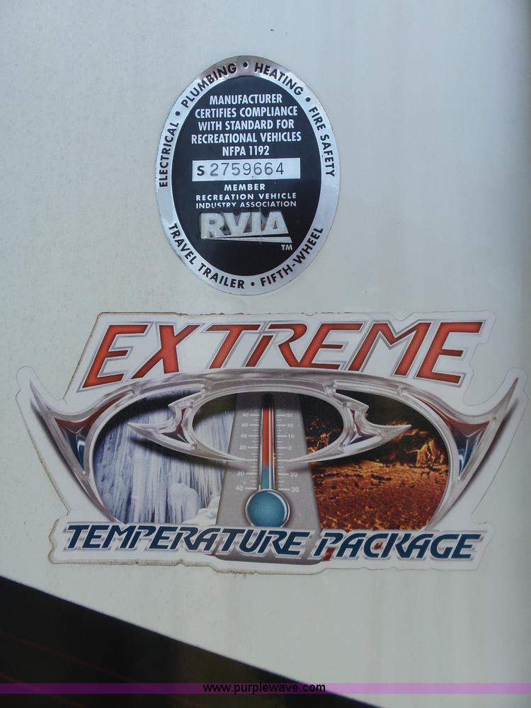 image for item L5791 2011 Raptor Velocity travel trailer RV