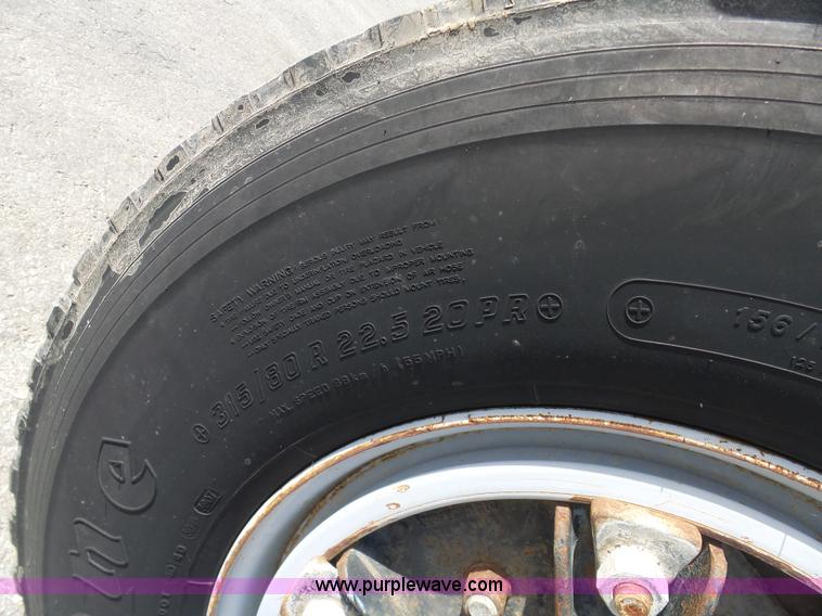 image for item L3209 1988 Mack DM690S roll off truck