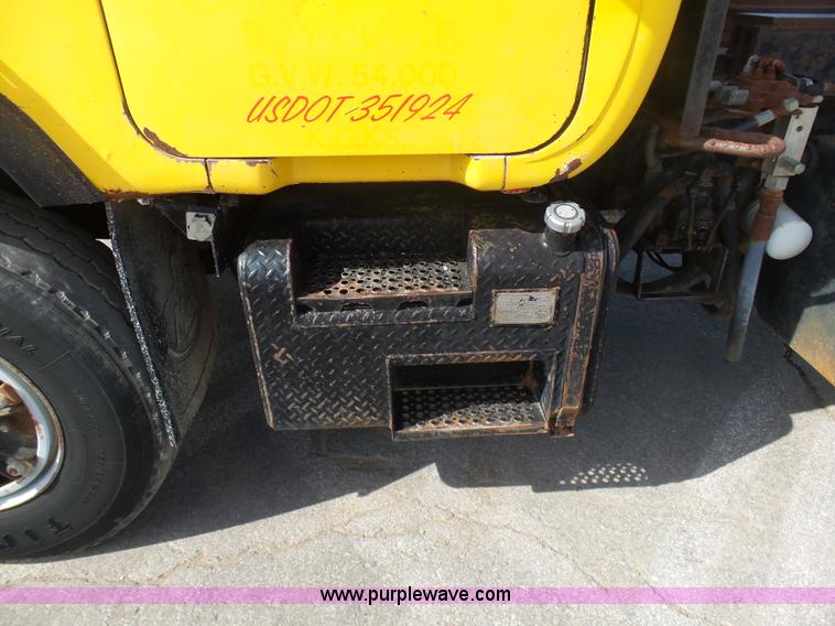 image for item L3209 1988 Mack DM690S roll off truck