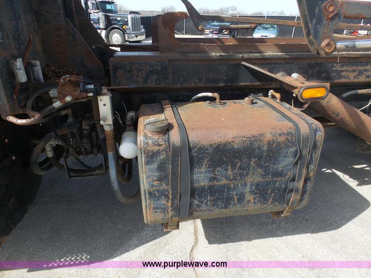 image for item L3209 1988 Mack DM690S roll off truck