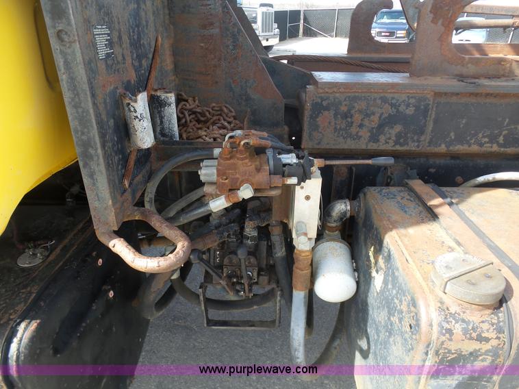 image for item L3209 1988 Mack DM690S roll off truck