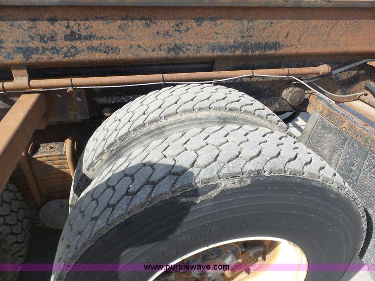 image for item L3209 1988 Mack DM690S roll off truck