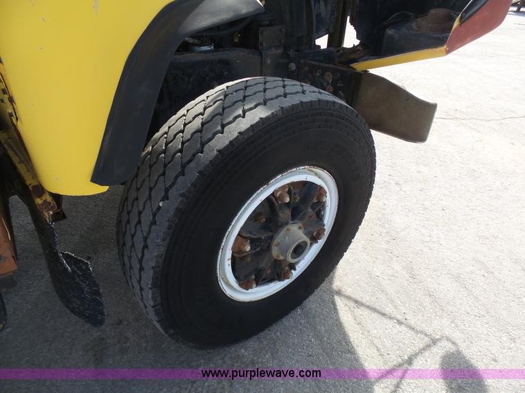 image for item L3209 1988 Mack DM690S roll off truck