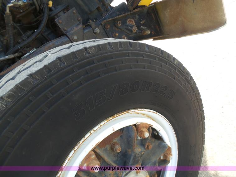 image for item L3209 1988 Mack DM690S roll off truck