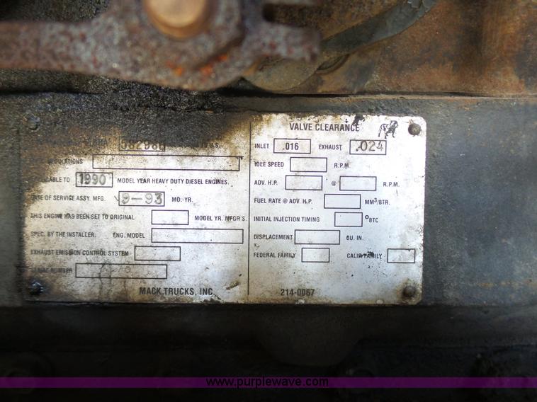 image for item L3209 1988 Mack DM690S roll off truck