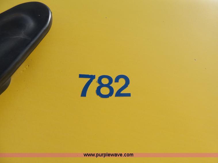 image for item L3209 1988 Mack DM690S roll off truck