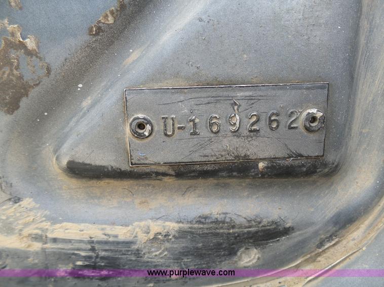 image for item L3209 1988 Mack DM690S roll off truck