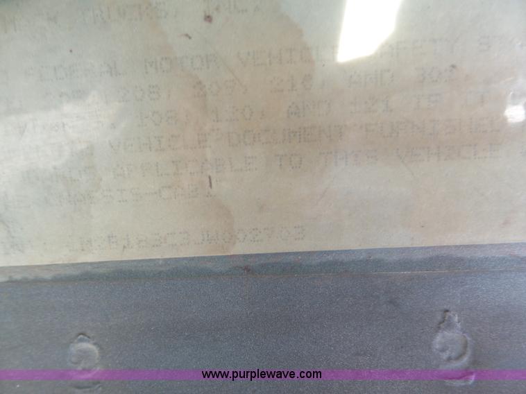 image for item L3209 1988 Mack DM690S roll off truck