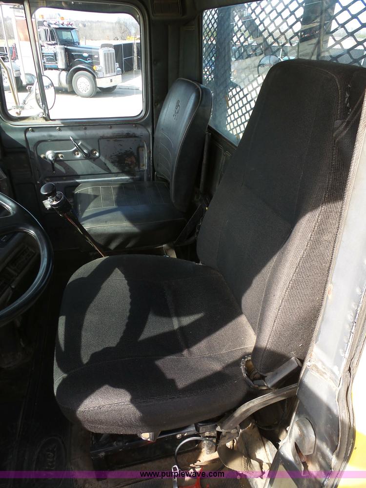 image for item L3209 1988 Mack DM690S roll off truck